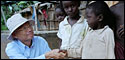 The professor meeting children in Africa